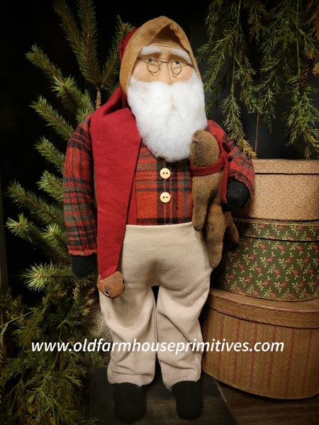 #OTC23-8 Primitive Mr. Santa Claus 🎅 Wearing Red Plaid Shirt And Suspenders Holding A Gingerbread Man