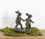 #8RS1033  Primitive Black Resin Rabbits Walking Hand In Hand