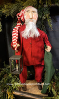 #HCBM99 Red Pajama Santa Holding Green Blanket & Lantern